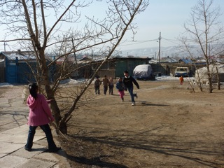 Children playing outside during break